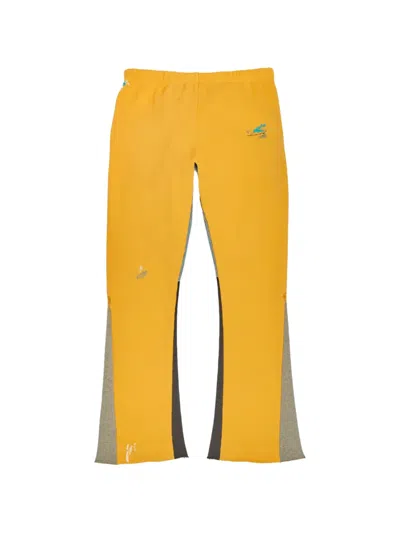 Gallery Dept. Logo Paint Splatter Flare Track Pants In Yellow