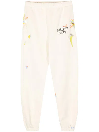 Gallery Dept. Tapered Logo-print Paint-splattered Cotton-jersey Sweatpants In Antique White