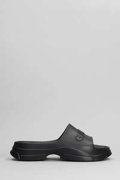 GANNI BLACK RUBBER SLIPPERS