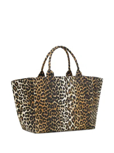 Ganni Borsa Shopper Xxl Pocket Print Bag In Brown
