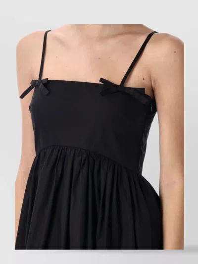 Ganni Bow Accented Flared Mini Dress In Black