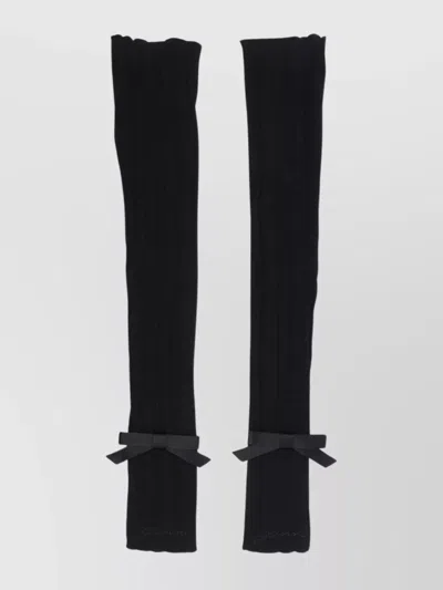 Ganni Bow Detail Ribbed Texture Wrist Warmers In Black