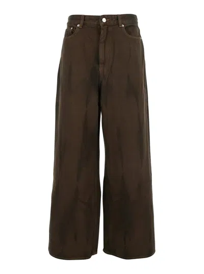 GANNI BROWN JEANS WITH TIE-DYE PATTERN AND LOGO PATCH ON BACK IN DENIM WOMAN