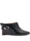 Ganni Buckle Wedge Mules In Black