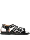 Ganni Buckle Sandals With Flat Sole And Metal Eyelets In Black
