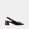 Ganni Feminine Buckle Slingback Pumps In Black