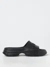 Ganni Logo-embossed Chunky Slides In Schwarz