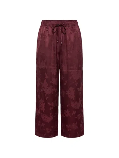 Ganni Floral-jacquard Drawstring Trousers In Black