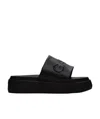 Ganni Logo-embossed Vegan Leather Platform Slides In Black