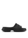 Ganni Logo-embossed Chunky Slides In Black