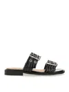 Ganni Buckled Eyelet-embellished Recycled Faux Patent-leather Sandals In Black