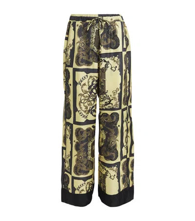 Ganni Silk Ornate Print Trousers In Yellow