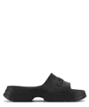 Ganni Logo-embossed Chunky Slides In Black