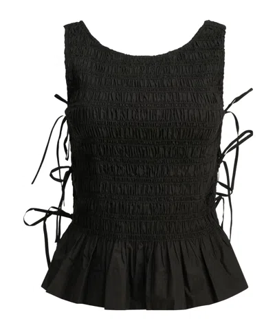 Ganni Smocked Peplum Top In Black