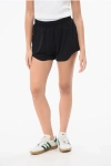 Ganni Solid Color Checked Rip Stop Shorts In Black
