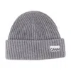 Ganni Womens Logo-patch Wool-blend Beanie Hat Paloma Melange In Gray
