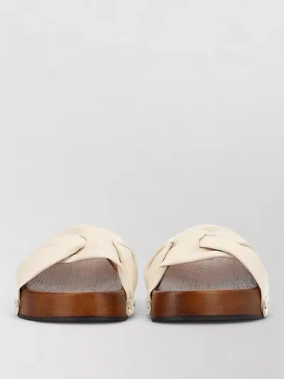 Ganni Studded Flat Slides Twisted Strap Design In White