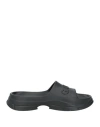 Ganni Logo-embossed Chunky Slides In Black