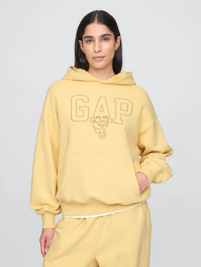Gap × Disney Adult Oversized Logo Hoodie In Straw Yellow