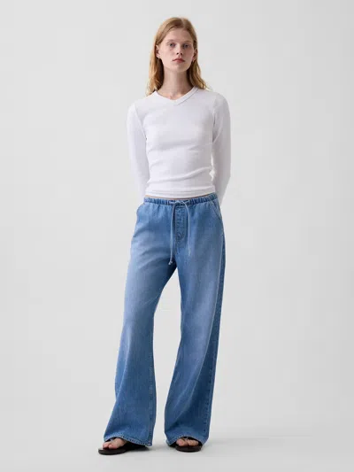 Gap Low Rise Ultrasoft Easy Baggy Flare Jeans In Medium Wash