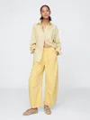 Gap Mid Rise Ultrasoft Easy Horseshoe Jeans In Straw Yellow