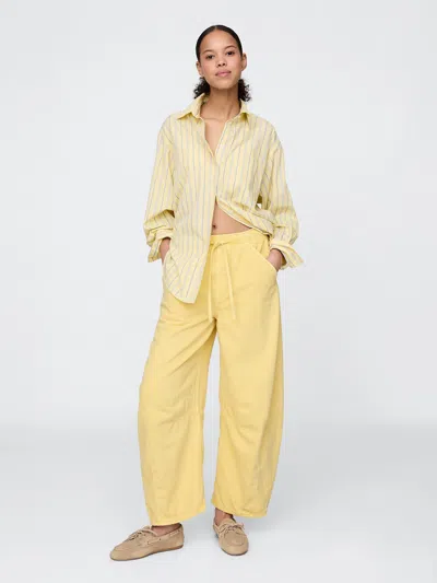 Gap Mid Rise Ultrasoft Easy Horseshoe Jeans In Straw Yellow