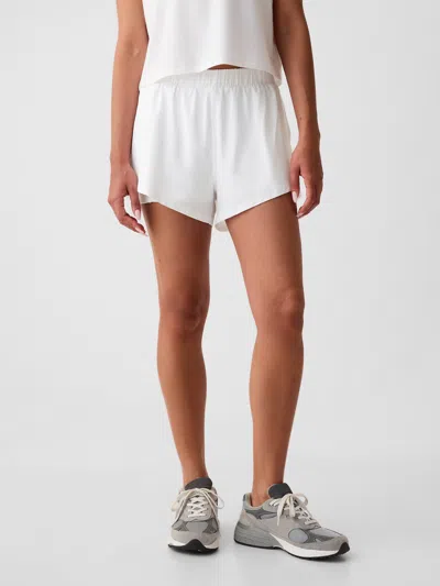 Gap Fit Mid Rise Dolphin Running Shorts In Optic White