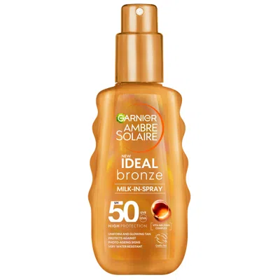 Garnier Ambre Solaire Ideal Bronze Milk-in Tanning Spf 50 Spray For Face And Body 150ml In White