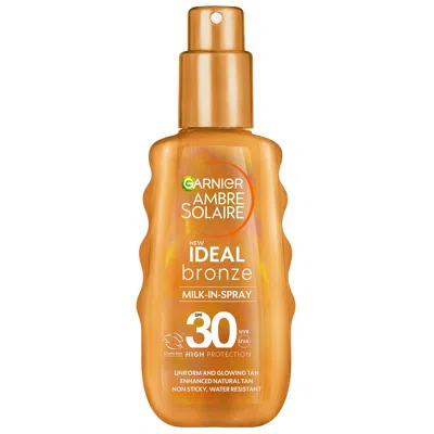 Garnier Ambre Solaire Ideal Bronze Milk-in Tanning Spray For Face And Body Spf30 150ml In White