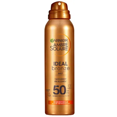 Garnier Ambre Solaire Ideal Bronze Tanning Mist For Face And Body Spf 50 150ml In White