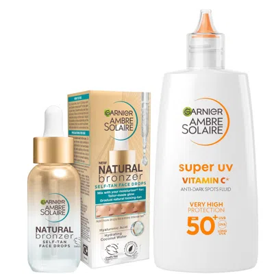 Garnier Glow And Protect Duo: Natural Bronzer Self-tan Drops And Ambre Solaire Vitamin C Facial Spf50+ Fluid In White