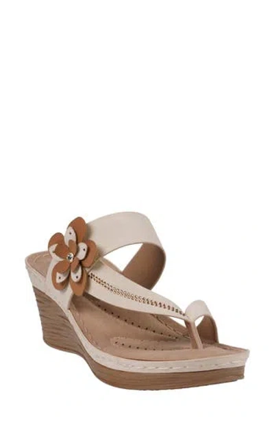 Gc Shoes Taryn Flower Wedge Sandal In Beige