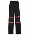 Gcds Logo-stripe Drawstring Trousers In Black