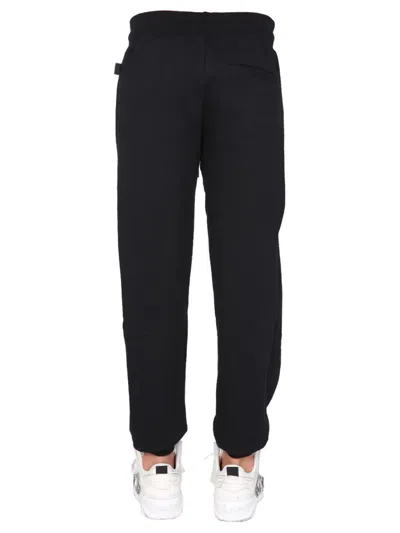 Gcds Jogging Pants With "cute Tape" Logo Band In Black