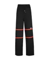 Gcds Logo-stripe Drawstring Trousers In Black