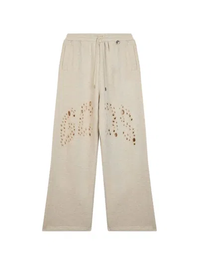 Gcds Logo-perforated Laser-cut Track Pants In Multi