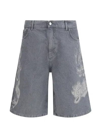Gcds Skull-print Denim Shorts In Gray
