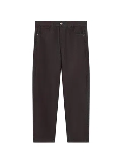 Gcds Sprayed Denim Trousers In Brown