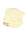 Gcds Crystal Logo Embellished Fur Beanie In Yellow