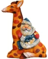 G.debrekht Santa On Giraffe Ornament In Multi