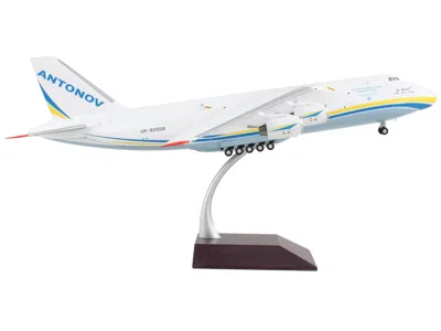 Geminijets Antonov 124-100m Commercial Aircraft "antonov Airlines" White With Blue And Yellow Stripes "gemini 2