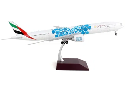 Geminijets Boeing 777-300er Commercial Aircraft "emirates Airlines - Dubai Expo 2020" White With Blue Graphics