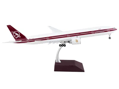 Geminijets Boeing 777-300er Commercial Aircraft With Flaps Down "qatar Airways" White With Dark Red Stripes "ge