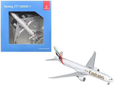 Geminijets Boeing 777-300er Commercial Aircraft With Flaps Down "emirates Airlines" (a6-eqh) White With Striped