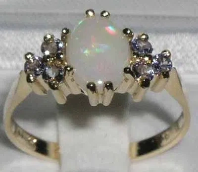 Pre-owned Gems Of America 10k Yellow Gold Natural Opal And Tanzanite Womens Classic Ring - Sizes 4 To 12 In Multicolor