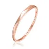 Genevive Jewelry Women's Classy Sterling Silver With Rose Gold Plating Bangle Bracelet In Gold
