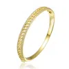 Genevive Jewelry Women's Genevive Sterling Silver Gold Plated With Cubic Zirconia Chain Link Stiff Bangle Bracelet In Gold