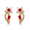 Genevive Jewelry Women's White / Red / Gold Sterling Silver Gold Plated Ruby Cubic Zirconia Flower Huggie Earrings In Multi
