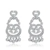 Genevive Jewelry Women's White / Silver Sterling Silver Clear Cubic Zirconia Accent Chandelier Earrings In Multi