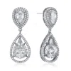 Genevive Jewelry Women's White / Silver Sterling Silver White Gold Plated Howlite Cubic Zirconia Halo Drop Earrings In Multi